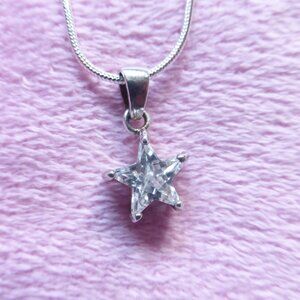 Sterling silver snake chain necklace with cubic zirconia star pendant